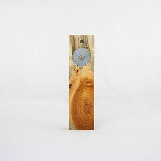 Bottle opener with beautiful natural wood knot.
